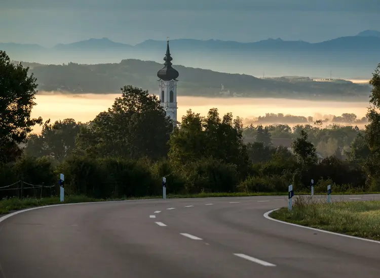 View of a village in the distance covered in mist