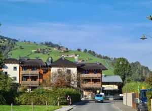 Alpine Hotel with hills in the background