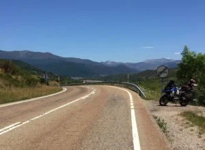 Motorbike parked by the side of the road in Spain